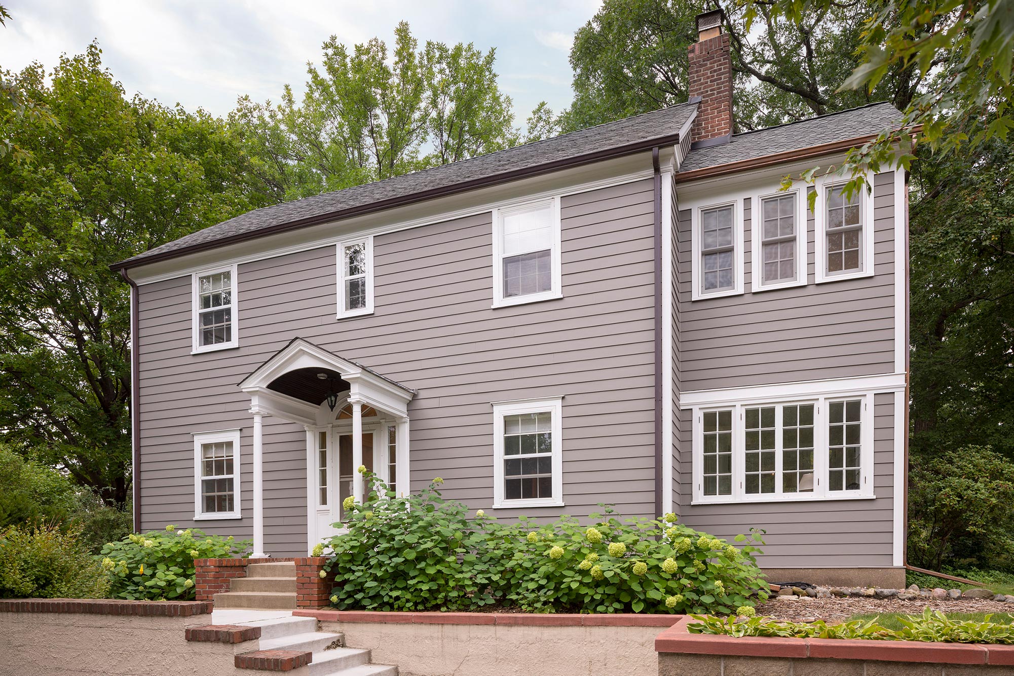 two story home with grey exterior