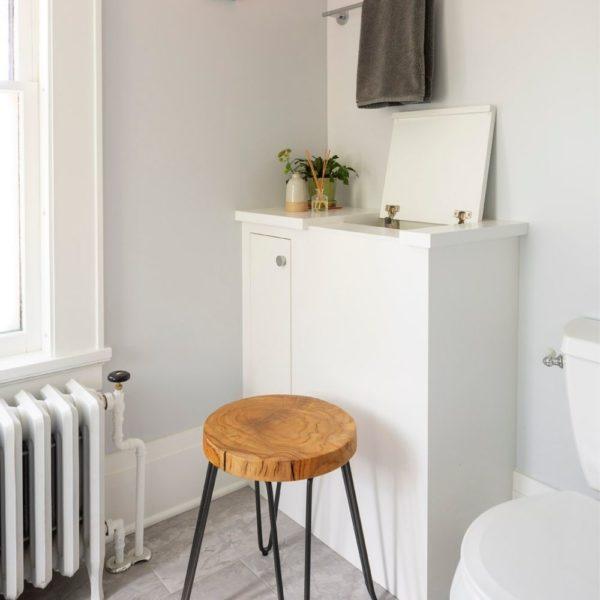 laundry chute opened with small stool